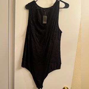 Black lace torrid body suit size 2
